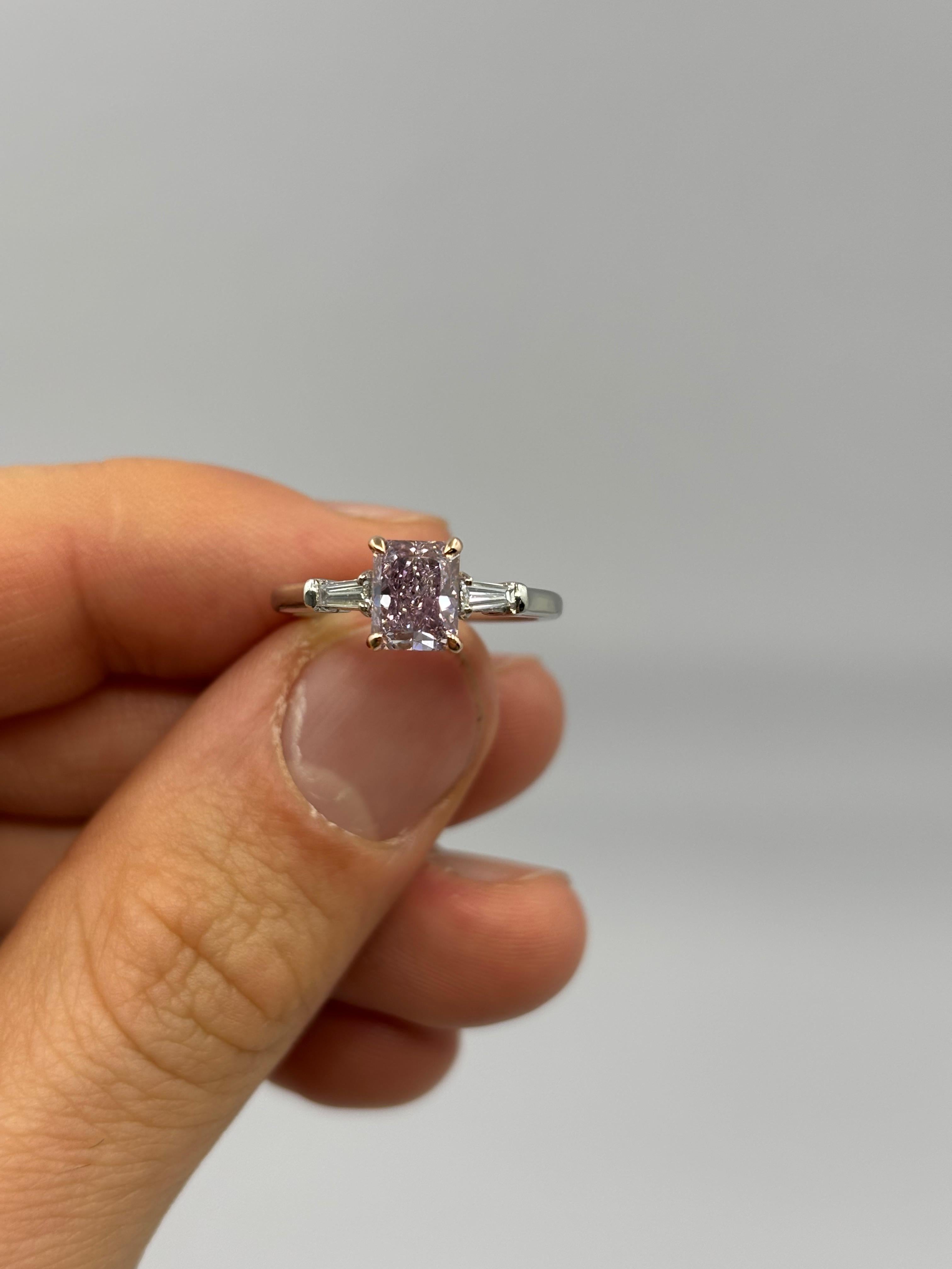 Radiant-Cut Pink Diamond Three-Stone Ring with Tapered Baguette Accents