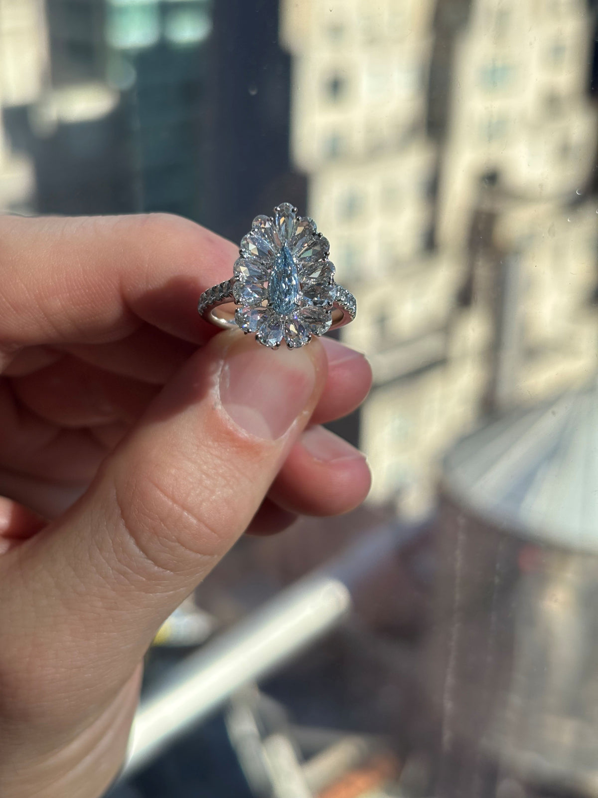 GIA 0.42 Carat Fancy Light Blue Pear Diamond Rose Cut Halo Platinum Ring