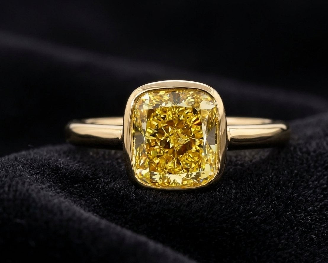 3.09 CT GIA Fancy Intense Yellow Cushion Cut Diamond Bezel Set Ring in 18K Yellow Gold