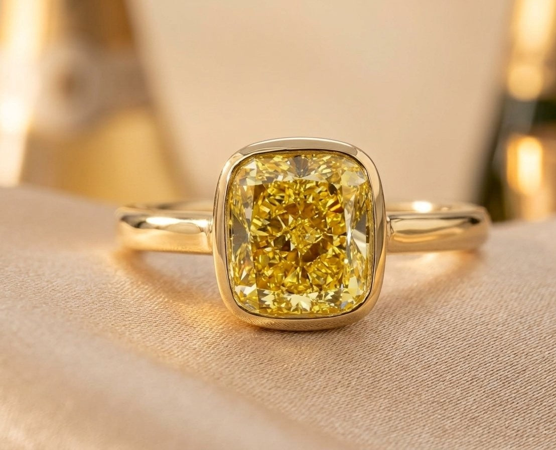 3.09 CT GIA Fancy Intense Yellow Cushion Cut Diamond Bezel Set Ring in 18K Yellow Gold