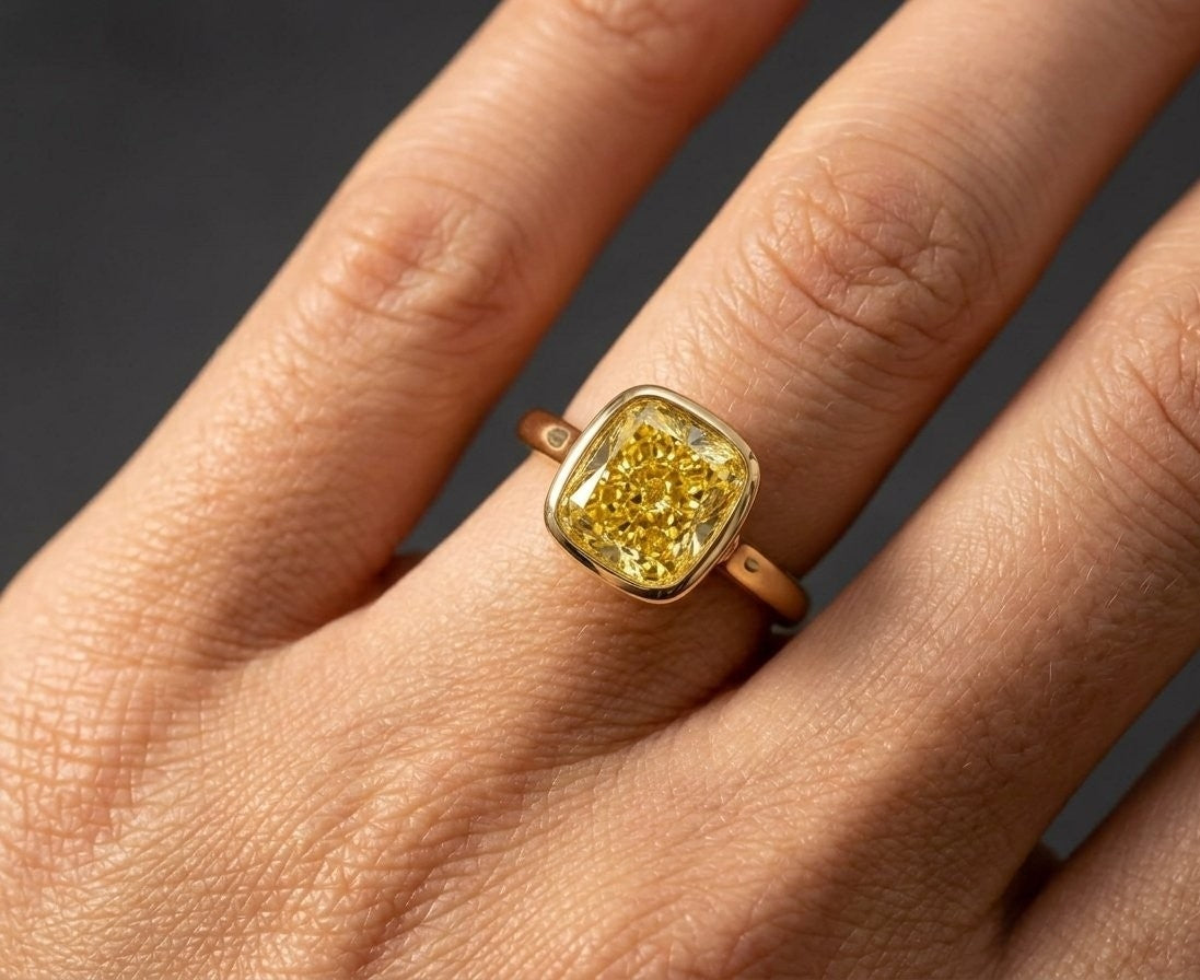 3.09 CT GIA Fancy Intense Yellow Cushion Cut Diamond Bezel Set Ring in 18K Yellow Gold