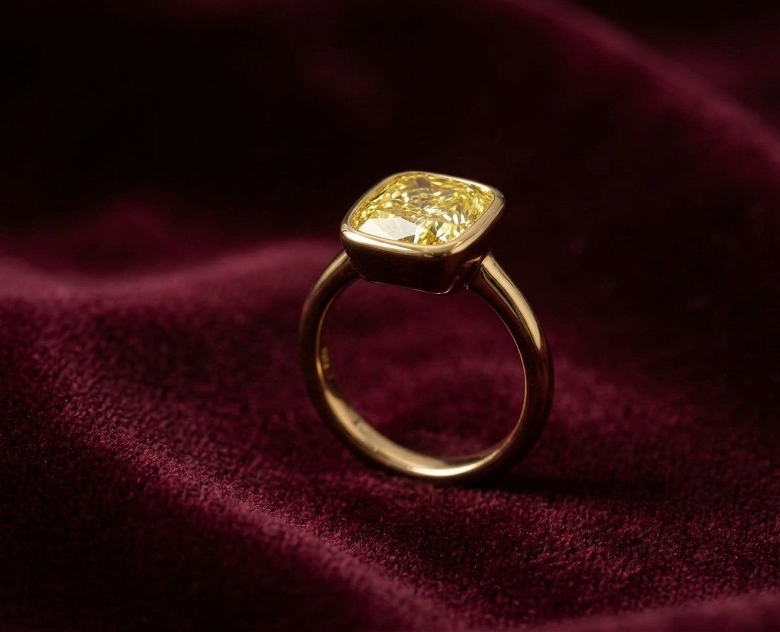 3.09 CT GIA Fancy Intense Yellow Cushion Cut Diamond Bezel Set Ring in 18K Yellow Gold