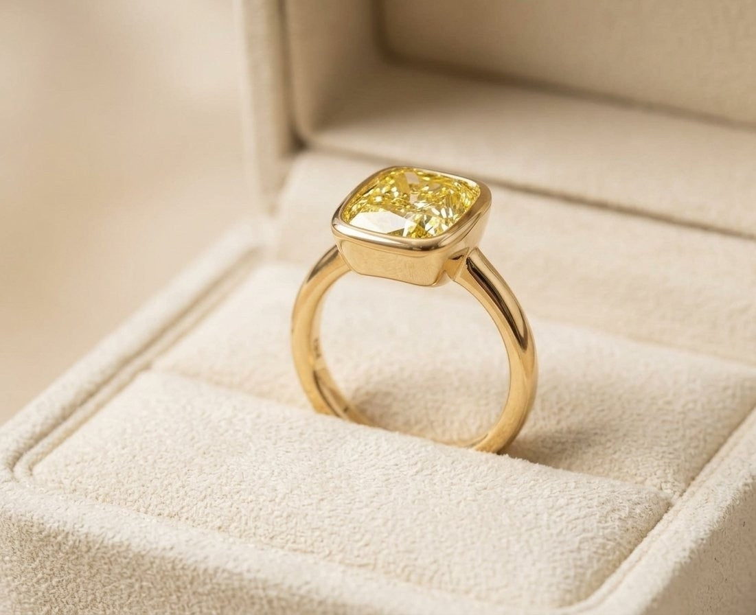 3.09 CT GIA Fancy Intense Yellow Cushion Cut Diamond Bezel Set Ring in 18K Yellow Gold