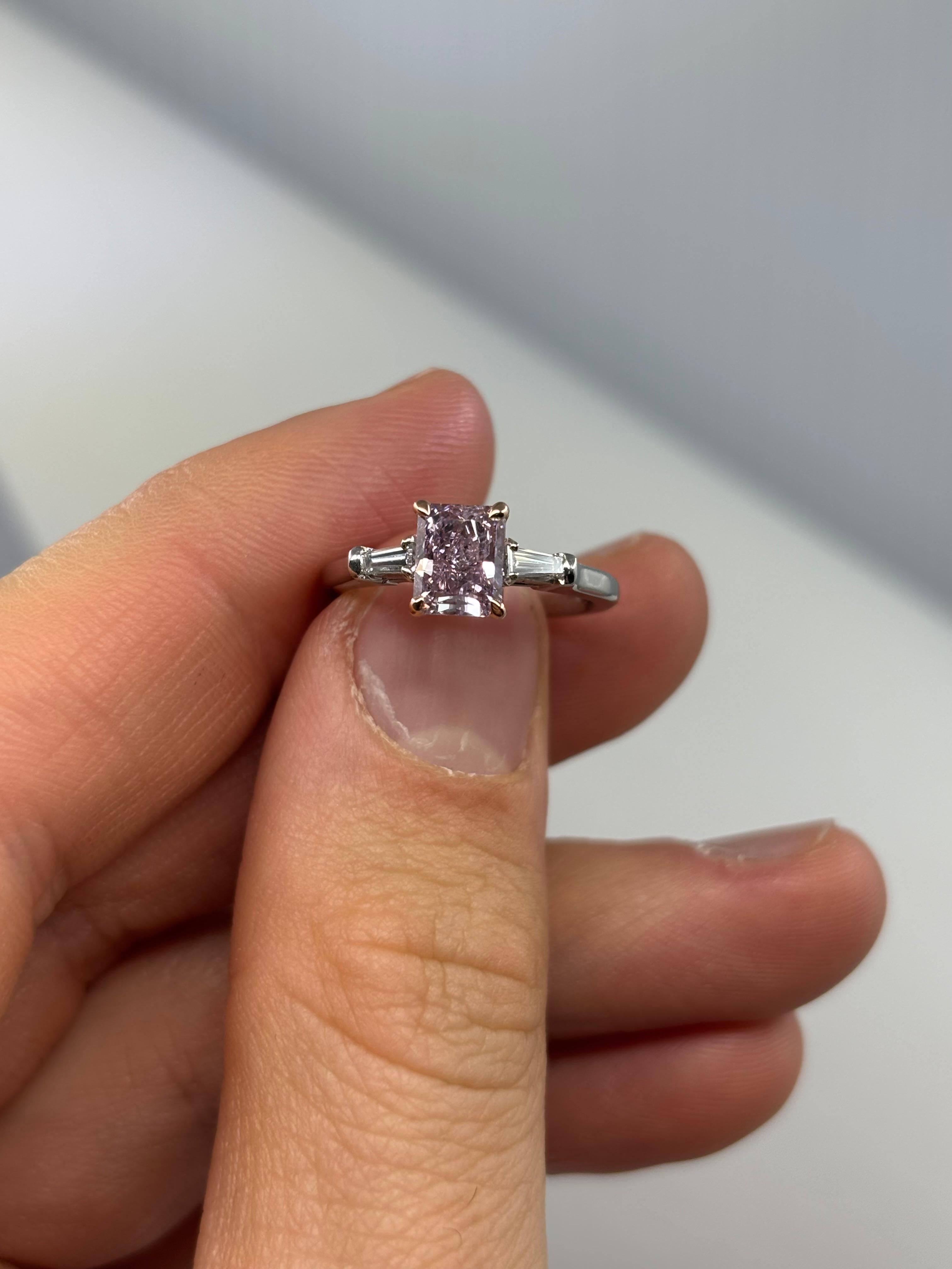 Radiant-Cut Pink Diamond Three-Stone Ring with Tapered Baguette Accents