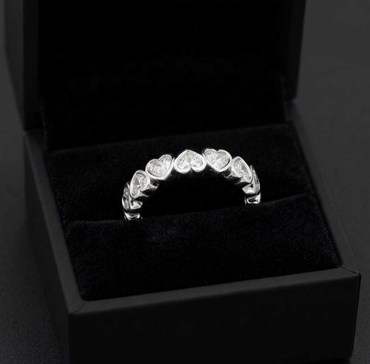 2.41 Carat Total Weight Heart Shape Diamond Bezel Eternity Band in Platinum, detail