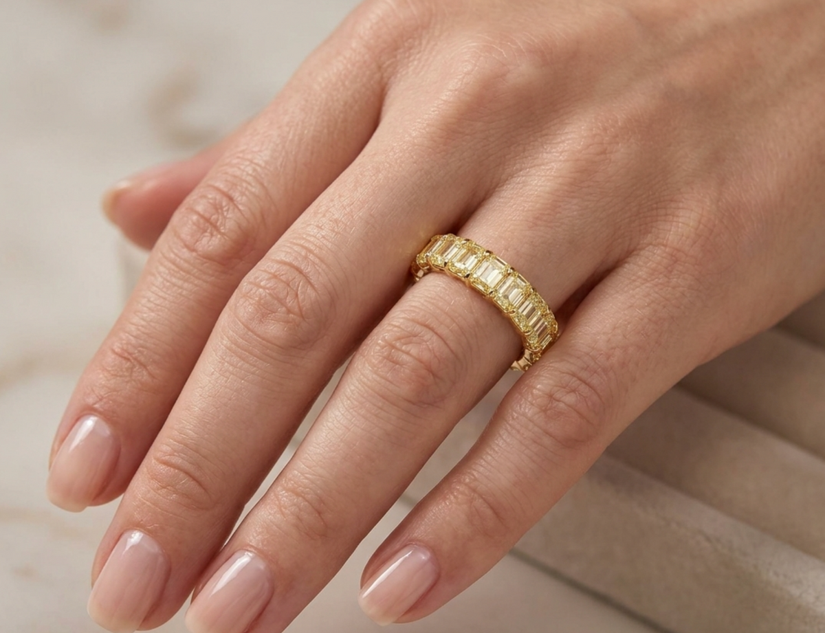 6.46 Carat Total Weight Fancy Yellow Diamond Emerald Cut Eternity Band in 18K Yellow Gold