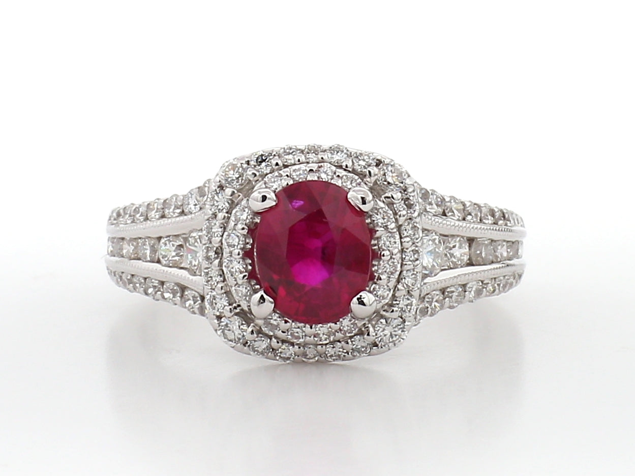 Oval Cut Ruby and Diamond Halo Ring